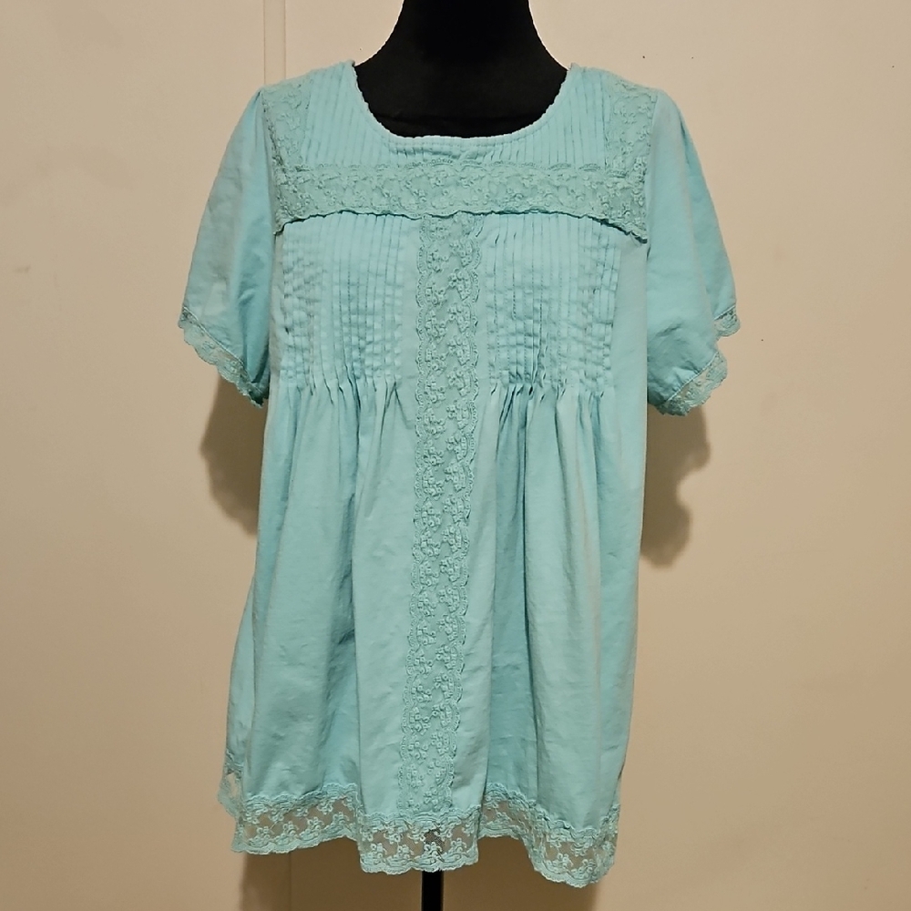 Woman Within Light Blue Blouse